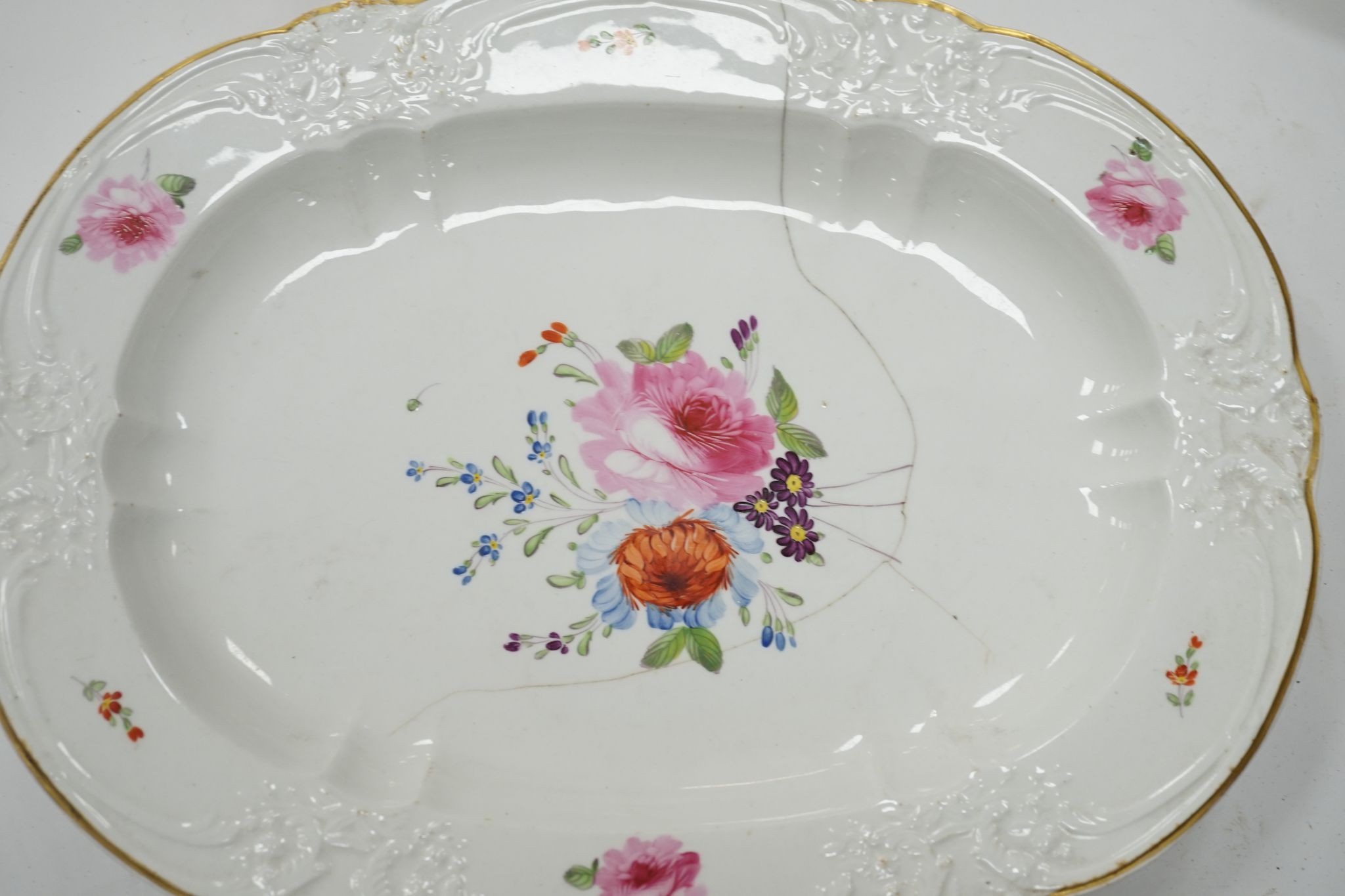 A 19th century floral painted part dinner service